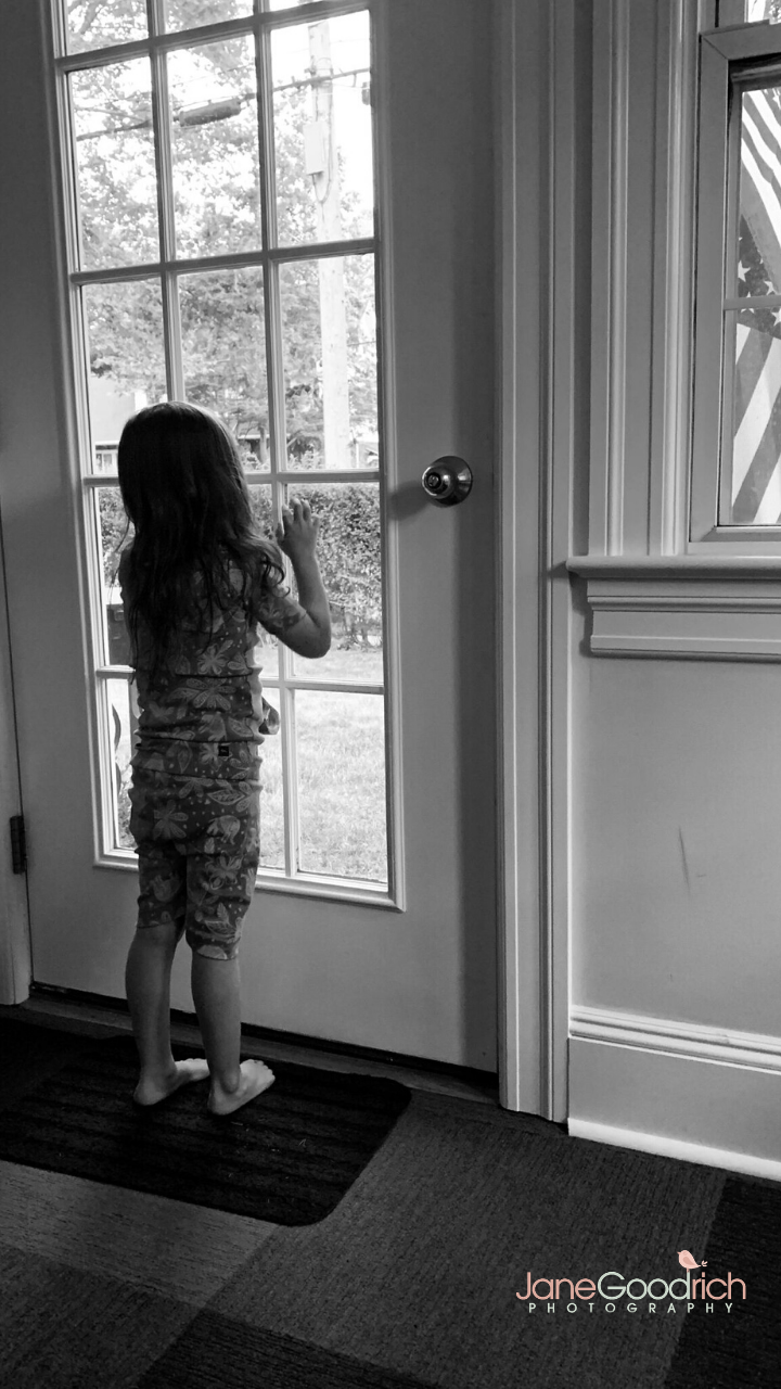 jane goodrich photography larchmont, NY child waving to family during quarantine