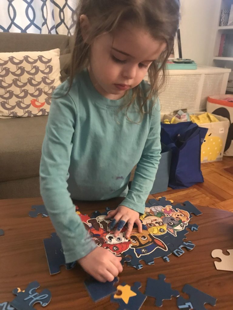 Jane Goodrich Photography Larchmont, NY child doing puzzle