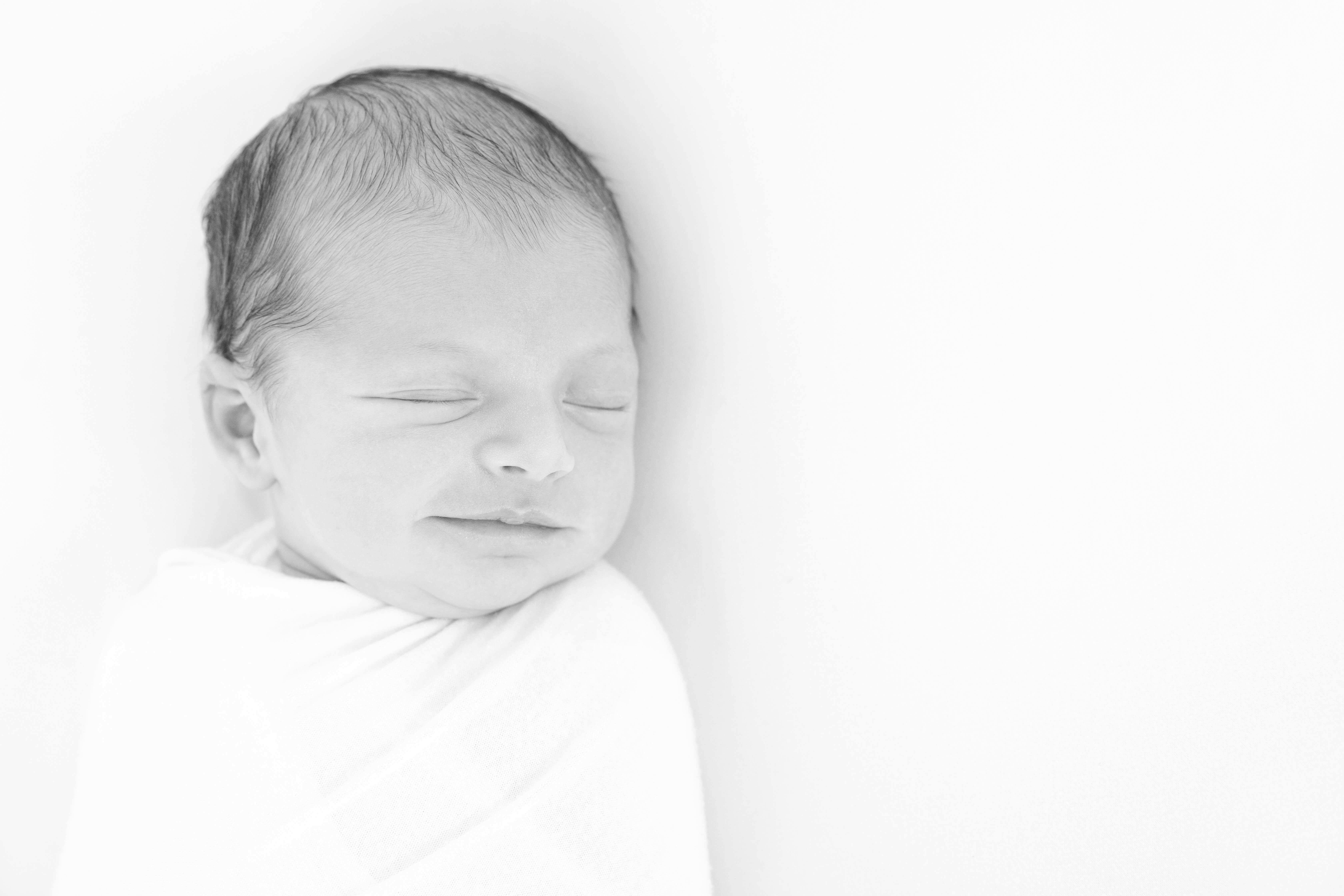Larchmont, NY newborn and sibling photography session - black and white newborn photograph