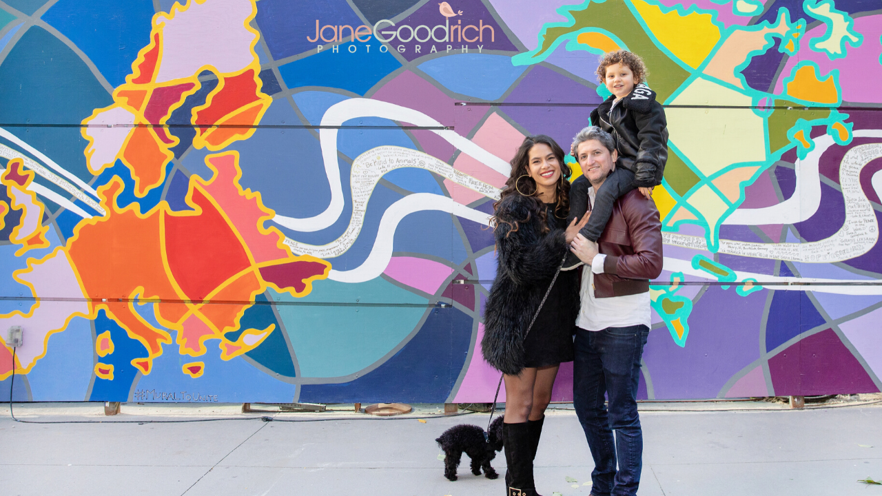 Urban family photography session with bright mural manhattan jane goodrich newborn baby and family photographer